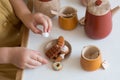 play in the children's kitchen, children's tea set, polymer sweets Royalty Free Stock Photo