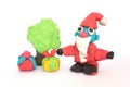 Play doh sculpture of Santa Claus on white background Royalty Free Stock Photo