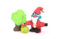 Play doh sculpture of Santa Claus on white background Royalty Free Stock Photo