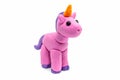 Play dough unicorn on white background. Handmade clay plasticine