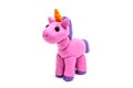 Play dough unicorn on white background. Handmade clay plasticine