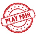 PLAY FAIR text on red grungy round rubber stamp