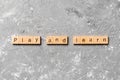 Play and learn word written on wood block. play and learn text on table, concept Royalty Free Stock Photo