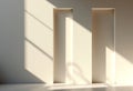 Play of light and geometry: Harsh sun shadows from window frames on the beige surface walls of an empty room Royalty Free Stock Photo