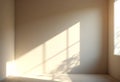 Play of light and geometry: Harsh sun shadows from window frames on the beige surface walls of an empty room Royalty Free Stock Photo