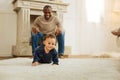 Glad child crawling on the floor Royalty Free Stock Photo