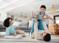 Play, mother or father with a boy on floor relaxing as a happy family bonding in Australia with love or care. Portrait