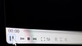 Play pause button press. Video player started. Camera shot of a computer screen. Royalty Free Stock Photo