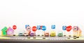 Play set of road signs and paper cars models Royalty Free Stock Photo