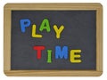 Play time in colored letters on slate