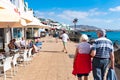 PLAYA BLANCA, SPAIN - DEC 14: Seaside promenade in Playa Blanca, the former fishermens village became a main touristic spot with