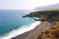 Playa de el Bollullo black volcanic sand beach in Tenerife, Canary Islands, Spain Royalty Free Stock Photo