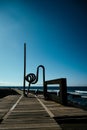 Playa de las Americas, Tenerife Spain. 18.12.2022 Stahl skulptur am Piscina Naturale against the background of sea and sky Royalty Free Stock Photo