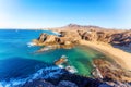 Playa de Papagayo Beach, desert landscape and blue sky. Lanzarote Royalty Free Stock Photo