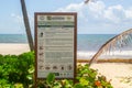 PLAYA DEL CARMEN, MEXICO - 19 April 2022: Beach information sign in Playa del Carmen
