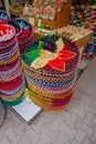 PLAYA DEL CARMEN, MEXICO - JANUARY 10, 2017: Beautiful and colorful mexican hats one above another in a market and