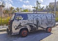 Old black broken dirty VW bus Volkswagen car rusting Mexico