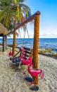 Colorful Riviera Maya swing lettering sign symbol on beach Mexico