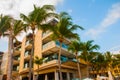 Playa del Carmen, Mexico, Riviera Maya: Facades of hotels and coconut palms against the blue sky