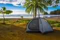 PLAYA MONTEZUMA, COSTA RICA, JUNE, 28, 2018: Outdoor view of camping tent located in the sandy beach of Montezuma with a