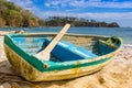 PLAYA MONTEZUMA, COSTA RICA, JUNE, 28, 2018: Outdoor view of small boat in the shore in Playa Montezuma during gorgeous
