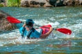 Playboating. Kayaking freestyle on whitewater. Eskimo roll