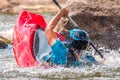 Playboating. Kayaking freestyle on whitewater. Eskimo roll