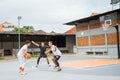 a player dribbling the ball will attack and two opposing players get in the way Royalty Free Stock Photo