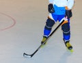 player with inline skates with stick during the match
