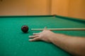 Player in the pool kick. Russian billiards Royalty Free Stock Photo