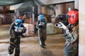 Player in red mask in paintball club