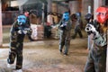 Player in red mask in paintball club