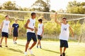 Player Scoring Goal In High School Soccer Match Royalty Free Stock Photo