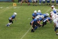 Player about to take hand off from quarterback