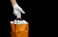 Player wearing a golf glove holding a bag full of golf balls Royalty Free Stock Photo