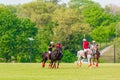 players in action during a polo match Royalty Free Stock Photo
