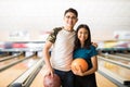 Players With Bowling Balls In Alley At Club Royalty Free Stock Photo