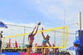 Players are playing in a match in the Women beach volleyball tournament in Nha Trang city