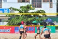 Players are playing in a match in the Women beach volleyball tournament in Nha Trang city