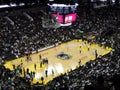 Players shoot around to warm-up during halftime