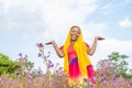 playful african girl having fun outdoor in a field