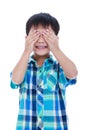 Playful asian boy covering his eye. Isolated on white background Royalty Free Stock Photo