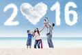 Playful asian family celebrate new year of 2016 Royalty Free Stock Photo