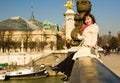 Playful beautiful woman in Paris