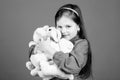 Playful beauty. toy shop. childrens day. Best friend. toys for kid. small girl with soft bear toy. hugging a teddy bear Royalty Free Stock Photo