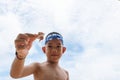 Playful boy and Hermit crab on the beach. Royalty Free Stock Photo