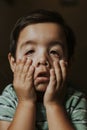 Playful boy making playful faces Royalty Free Stock Photo