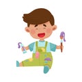 Playful Boy in Stained Clothes Sitting and Holding Paintbrush and Paint Vector Illustration