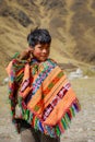 Playful boy wearing traditional Peruvian dress Royalty Free Stock Photo
