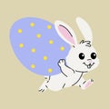 Playful Bunny Running with Colorful Easter Egg Royalty Free Stock Photo